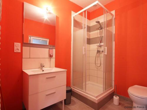 a bathroom with a shower and a sink and a toilet at Appartement cosy au-dessus d'un café littéraire avec jardin et location de vélos, proche de Condé-en-Normandie - FR-1-497-93 in Ségrie-Fontaine