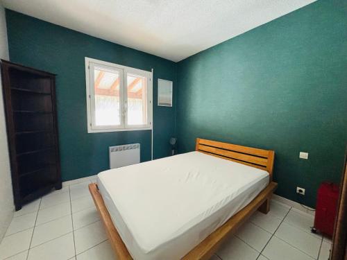 Posteľ alebo postele v izbe v ubytovaní Villa F3 avec Jardin et Garage, Capacité 6 Pers., Proche Plage et Village - Argelès-sur-Mer - FR-1-309-336