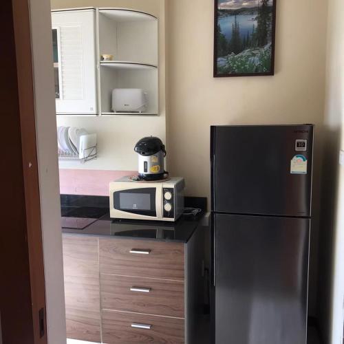 Η κουζίνα ή μικρή κουζίνα στο The Ozone Krabi Condotel