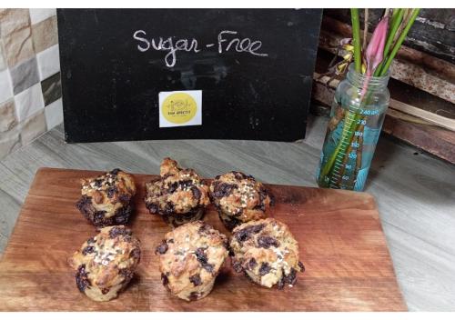 a group of muffins on a wooden cutting board at Busuanga Nature Retreat in Busuanga
