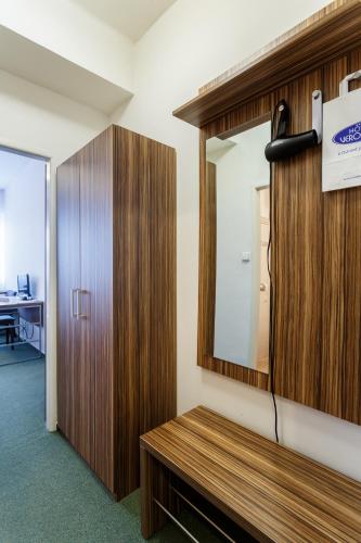 TV a/nebo společenská místnost v ubytování Hotel Veronika