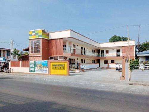 a building on the side of a street at RedDoorz at Ranchotel Kalibo Aklan in Kalibo