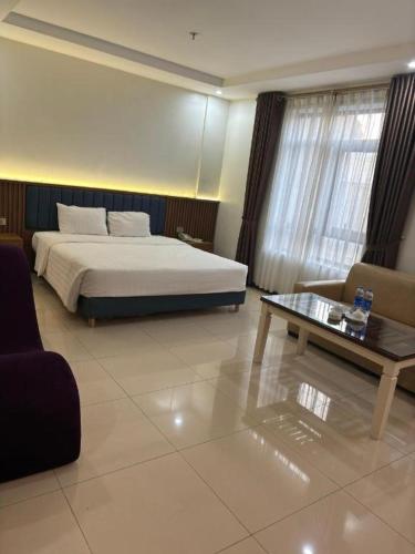 Katil atau katil-katil dalam bilik di Smart Hotel