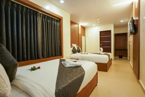 Katil atau katil-katil dalam bilik di Royal Plaza City
