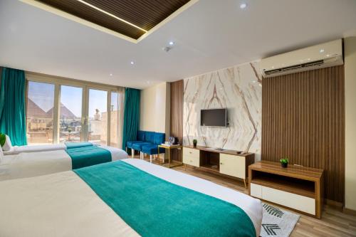 Μια τηλεόραση ή/και κέντρο ψυχαγωγίας στο Pyramids Yard Hotel