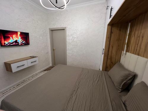 Postel nebo postele na pokoji v ubytování OS Shaumyana