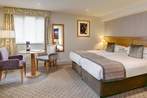 Ein Bett oder Betten in einem Zimmer der Unterkunft Quy Mill Hotel & Spa, Cambridge