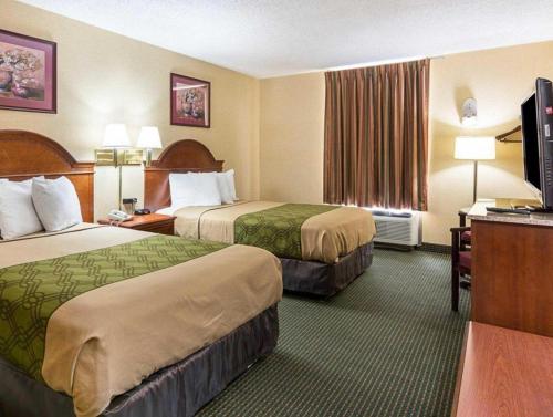 Postel nebo postele na pokoji v ubytování Econo Lodge Near Quantico Marine Base
