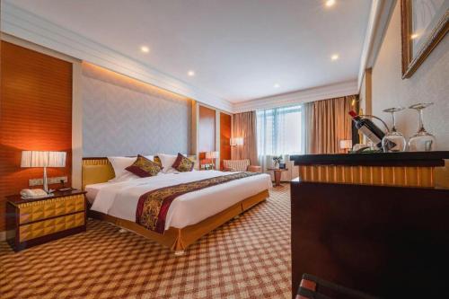 Cama o camas de una habitación en Nanning Yongjiang Hotel