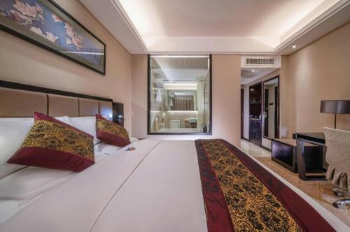 Cama o camas de una habitación en Nanning Yongjiang Hotel
