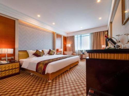 Cama o camas de una habitación en Nanning Yongjiang Hotel