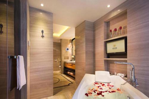 Letto o letti in una camera di Urumqi Tianyuan Hotel