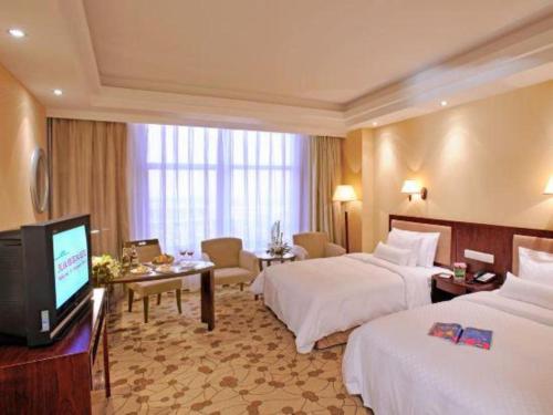 TV o dispositivi per l'intrattenimento presso Urumqi Tianyuan Hotel