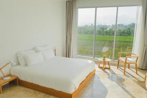 Postel nebo postele na pokoji v ubytování HOTEL DAWA