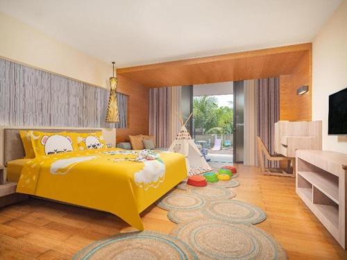 Postel nebo postele na pokoji v ubytování Wulan Resort Hainan ClearWater Bay