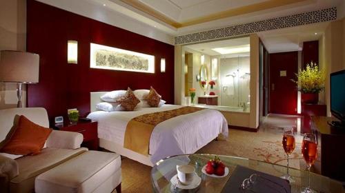 Katil atau katil-katil dalam bilik di New Century Hotel Zaozhuang Fengming