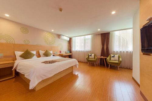 Postel nebo postele na pokoji v ubytování GreenTree Inn Tangshan Yuhua Road
