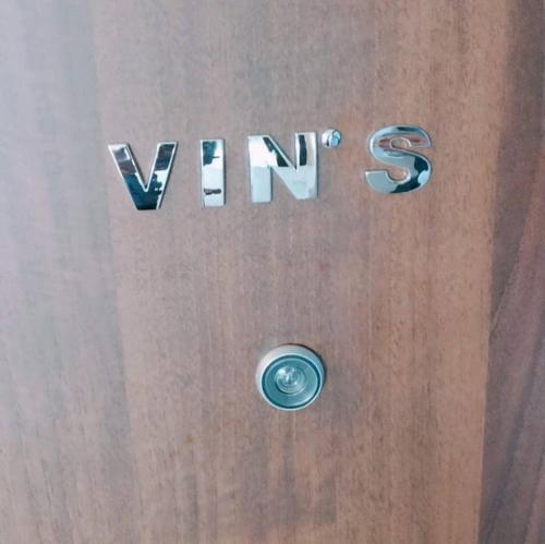 a door with the word vans written on it at Vin's Apartment in Adro