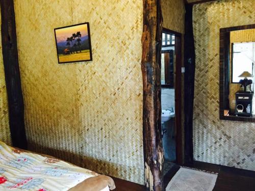 Postel nebo postele na pokoji v ubytování Chiang Dao Hut