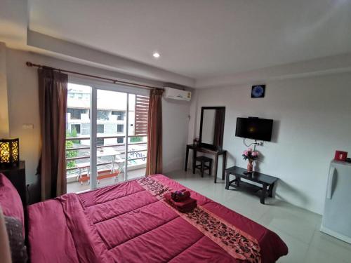 Katil atau katil-katil dalam bilik di Tontalay Hotel