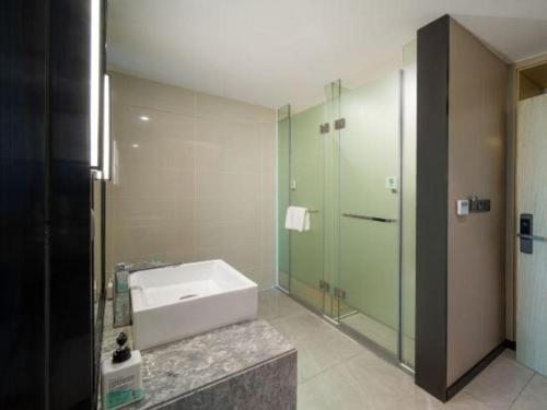 Koupelna v ubytování Echarm Hotel Yangjiang Baili Plaza