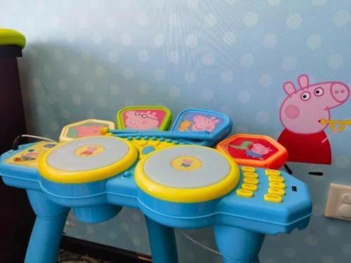 a childs toy table and chairs in a room at Hefei Parkview Hotel in Hefei