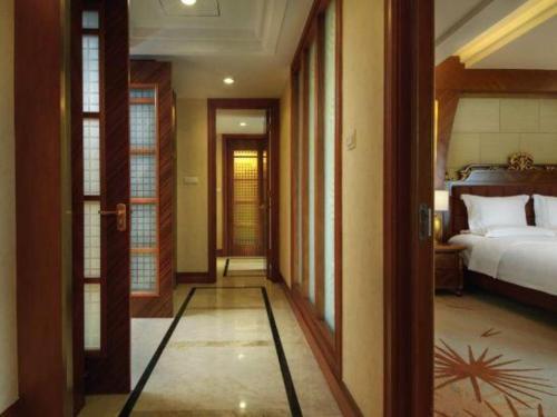 Letto o letti in una camera di Hongzhushan Hotel Mount Emei