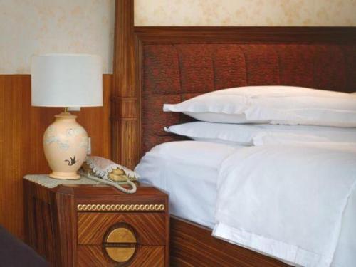Letto o letti in una camera di Hongzhushan Hotel Mount Emei
