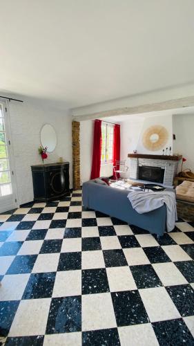 Postel nebo postele na pokoji v ubytování Vacances au cœur de la Provence, en famille ou entre amis