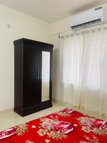 Postel nebo postele na pokoji v ubytování Uttara Premium Luxury Apartment