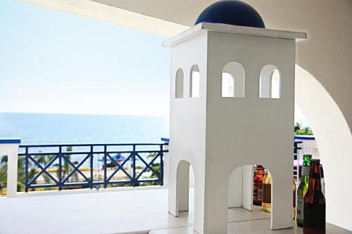 a balcony with a view of the ocean at Thunderbird Resorts - Poro Point in San Fernando