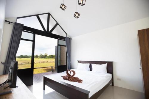 Postel nebo postele na pokoji v ubytování Fang Modern Hotel