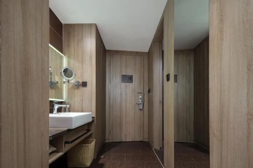 Ένα μπάνιο στο Atour Hotel Suzhou Jinji Lake Ligongdi