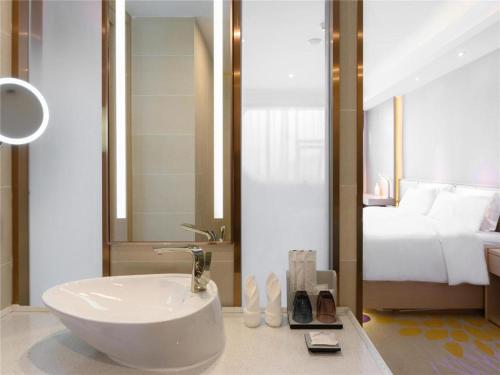 Ένα μπάνιο στο Lavande Hotel Deyang Guanghan