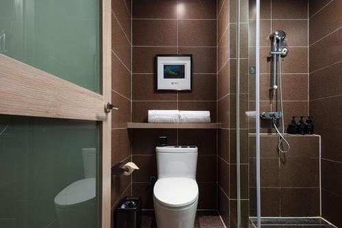 Ένα μπάνιο στο Atour Hotel Suzhou Jinji Lake Ligongdi