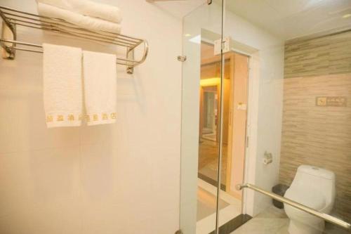 Koupelna v ubytování BI YING HOTEL