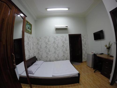 Кровать или кровати в номере Spring Hotel