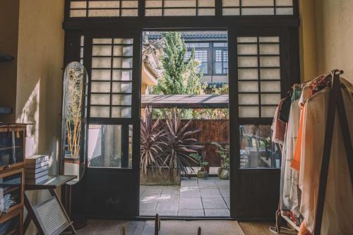 Fotografie z fotogalerie ubytování 以山屋舍izan国风禅意庭院 大理龙龛店 v destinaci Dali Ancient Town