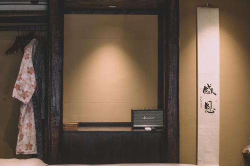 Fotografie z fotogalerie ubytování 以山屋舍izan国风禅意庭院 大理龙龛店 v destinaci Dali Ancient Town