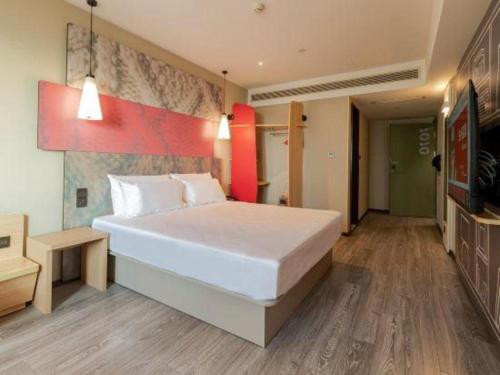 Cama o camas de una habitación en Ibis Harbin Normal University