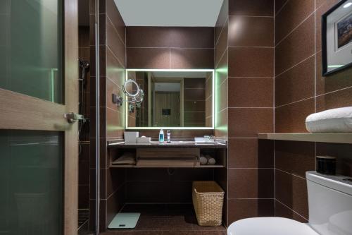 Ένα μπάνιο στο Atour Hotel Suzhou Jinji Lake Ligongdi