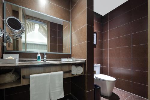 Ένα μπάνιο στο Atour Hotel Suzhou Jinji Lake Ligongdi