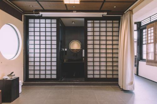 Fotografie z fotogalerie ubytování 以山屋舍izan国风禅意庭院 大理龙龛店 v destinaci Dali Ancient Town
