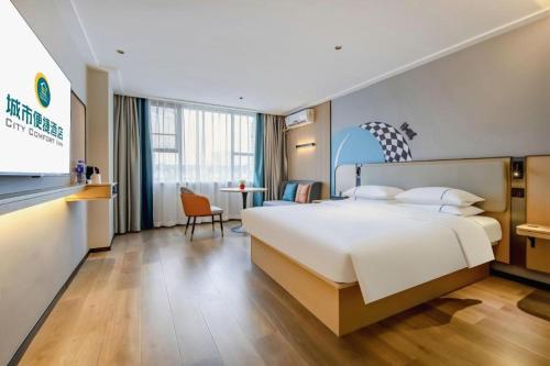 Postel nebo postele na pokoji v ubytování City Comfort Inn Beihai Hepu Bus Terminal
