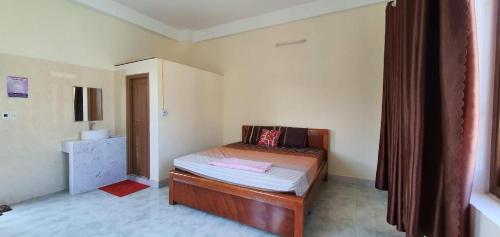 Postel nebo postele na pokoji v ubytování SPOT ON 1021 Dai Thang Motel