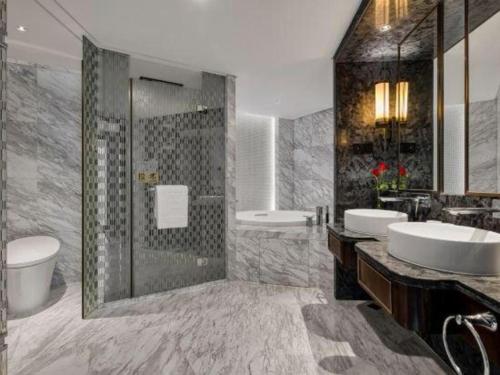 Koupelna v ubytování Hainan Junhua Haiyi Hotel