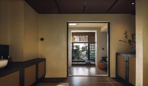 Fotografie z fotogalerie ubytování 以山屋舍izan国风禅意庭院 大理龙龛店 v destinaci Dali Ancient Town