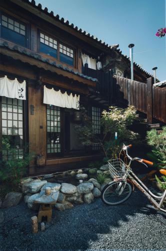 Fotografie z fotogalerie ubytování 以山屋舍izan国风禅意庭院 大理龙龛店 v destinaci Dali Ancient Town