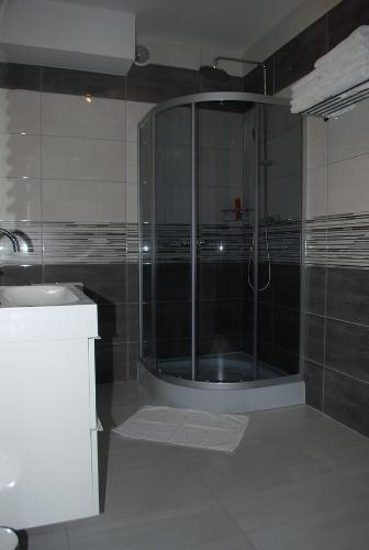 Een badkamer bij Apartament Zwyciezcow