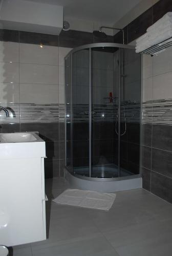 Ένα μπάνιο στο Apartament Zwyciezcow